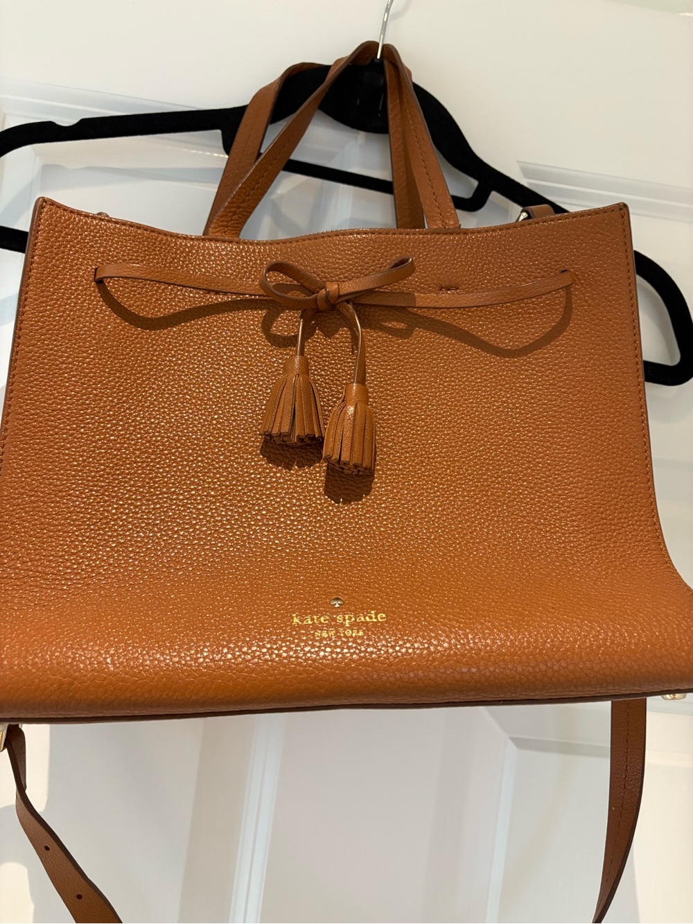 kate spade tan pebbled leather tote with tassel bow